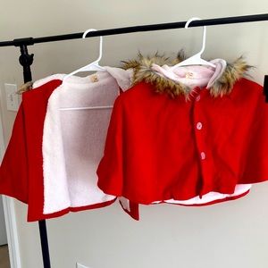 Matching red capes with fur lined hoods